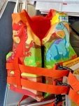 Full Throttle 104300-200-001-15 - Water Buddies Dinosaur Child Life Vest. Fixed Price $49.99.