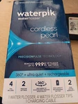 Waterpik Wf-13cd012 Rechargeable Cordless Pearl Water Flosser Black. Fixed Price $34.99.