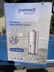 Stainless Steel Purewell Gravity-fed Water Filter System 2.25 Gallon. Fixed Price $99.00.